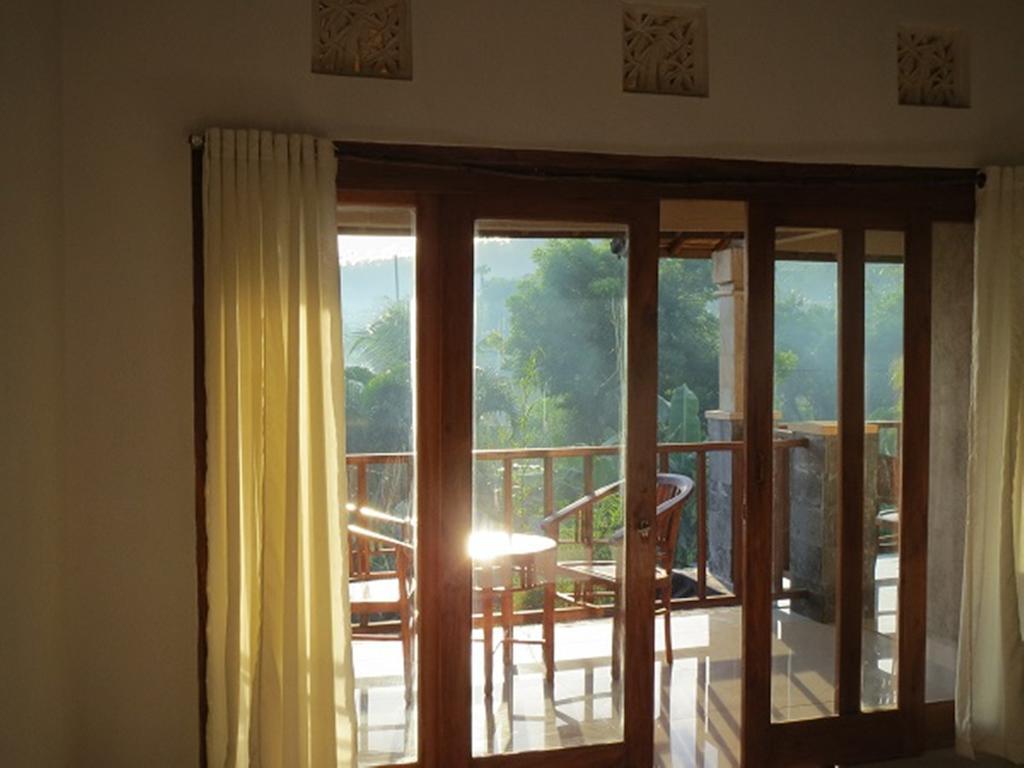 אמד Bali Sari Homestay חדר תמונה